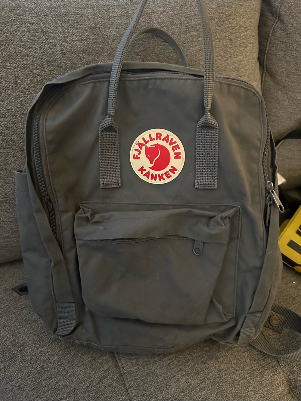Fjallraven Kanken Backpack in Dark Gray with Red Logo